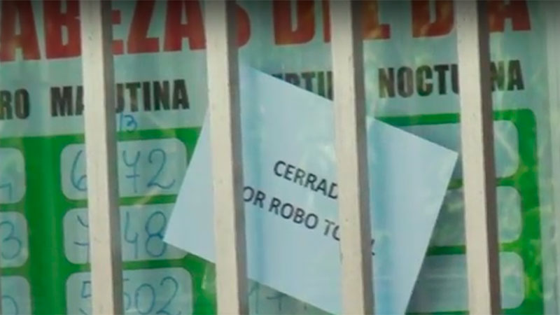 "Cerrado por robo", indica el cartel de la Tómbola