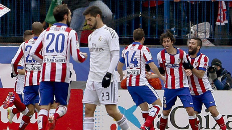 ATL&Eacute;TICO MADRID. Los jugadores celebran la victoria.