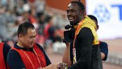 El reencuentro de Usain Bolt con el camarógrafo que lo derribó