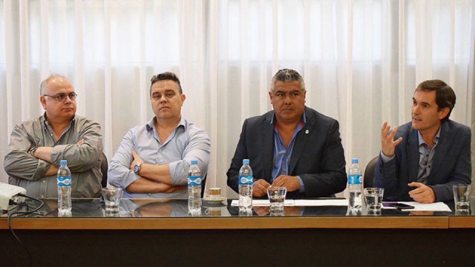 Tapia y Elizondo, representantes de AFA y Superliga.